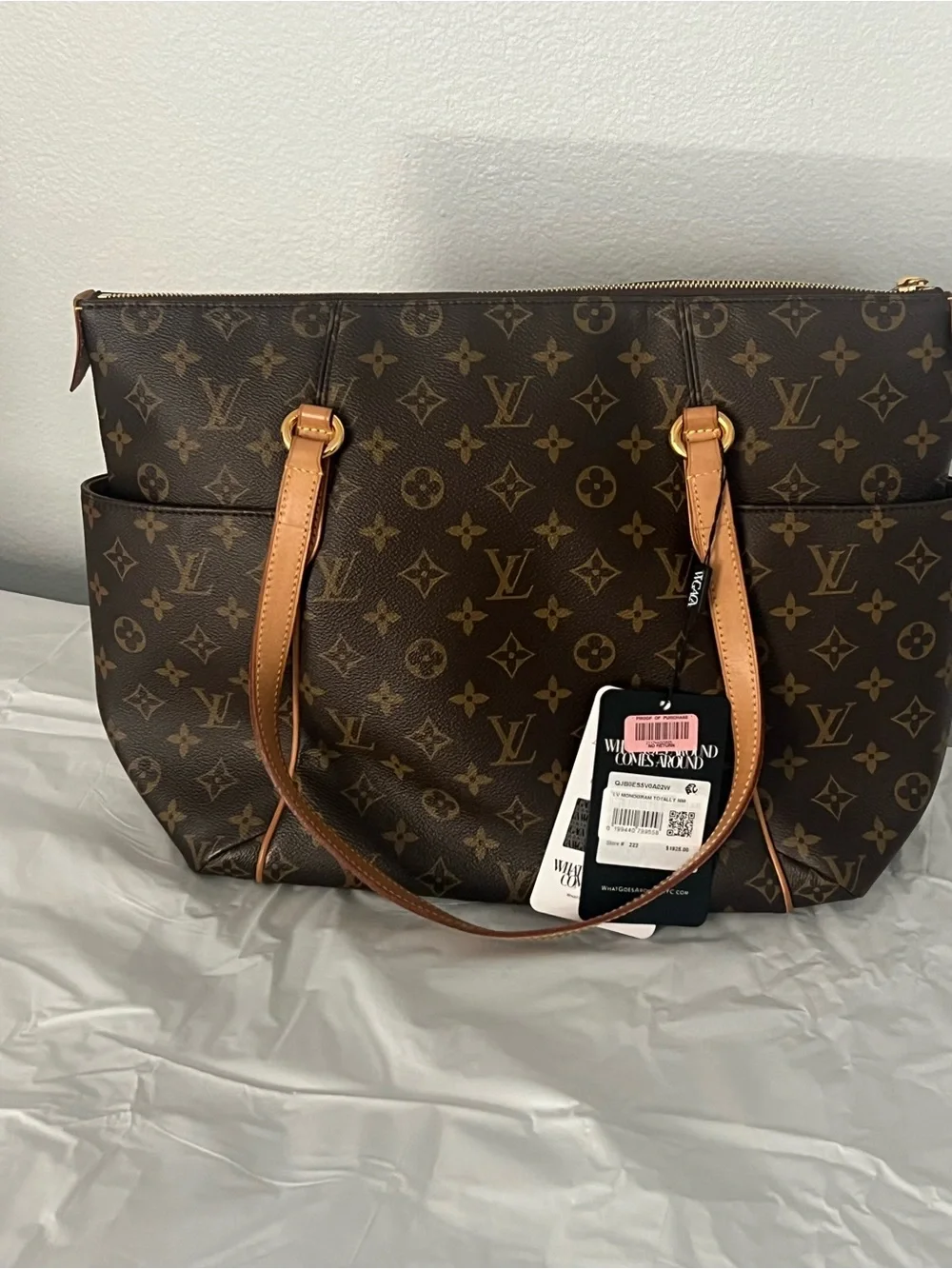 Louis Vuitton Monogram Canvas Tote in Brown with Tan Handles